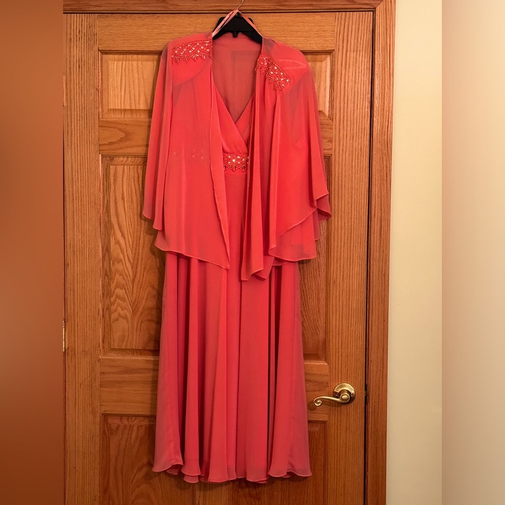 Formal sleeveless dress with light weight jacket